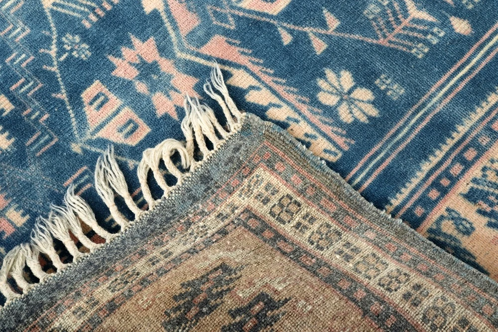 Textures and patterns in color from woven carpets